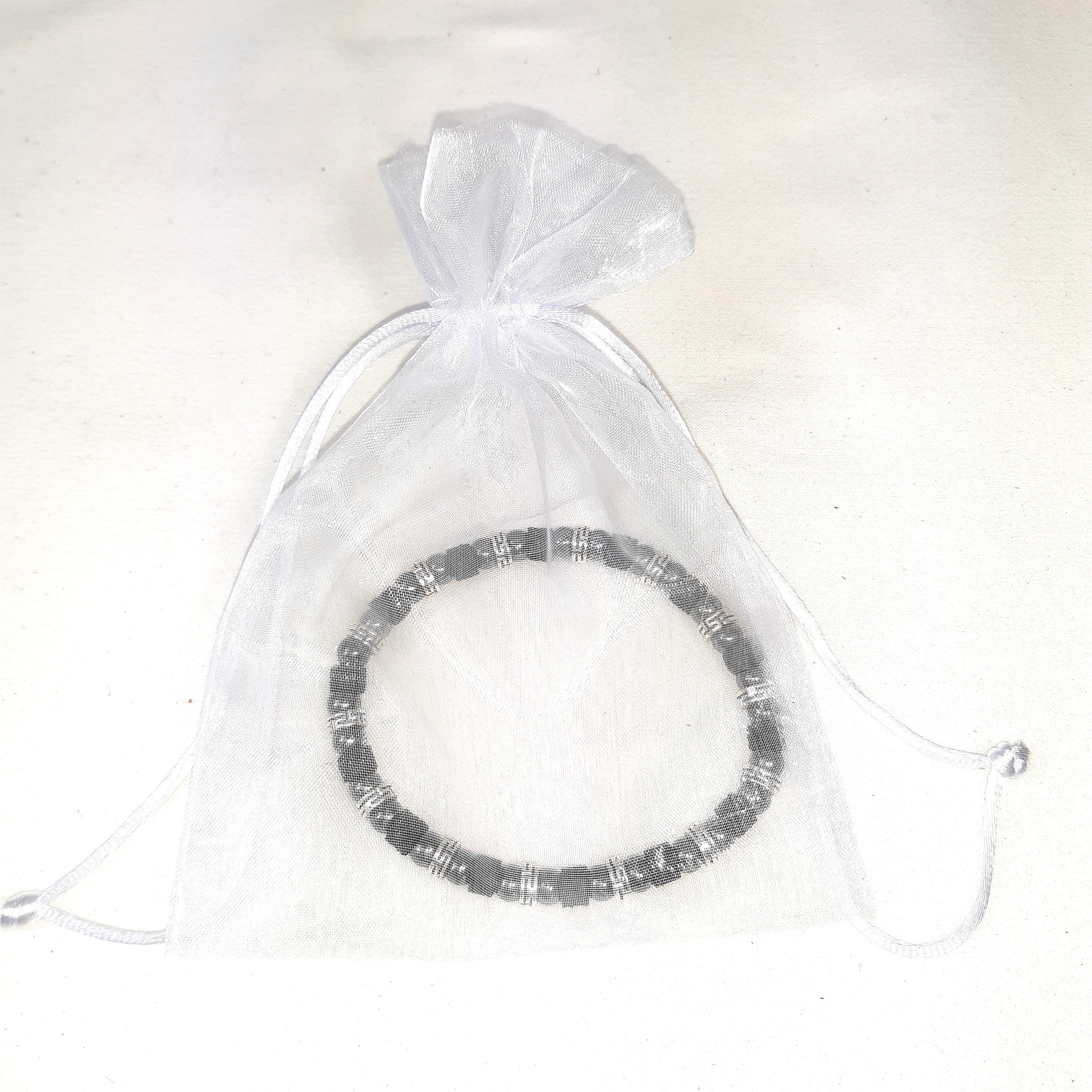 Bracelet extensible cuir et h&eacute;matite