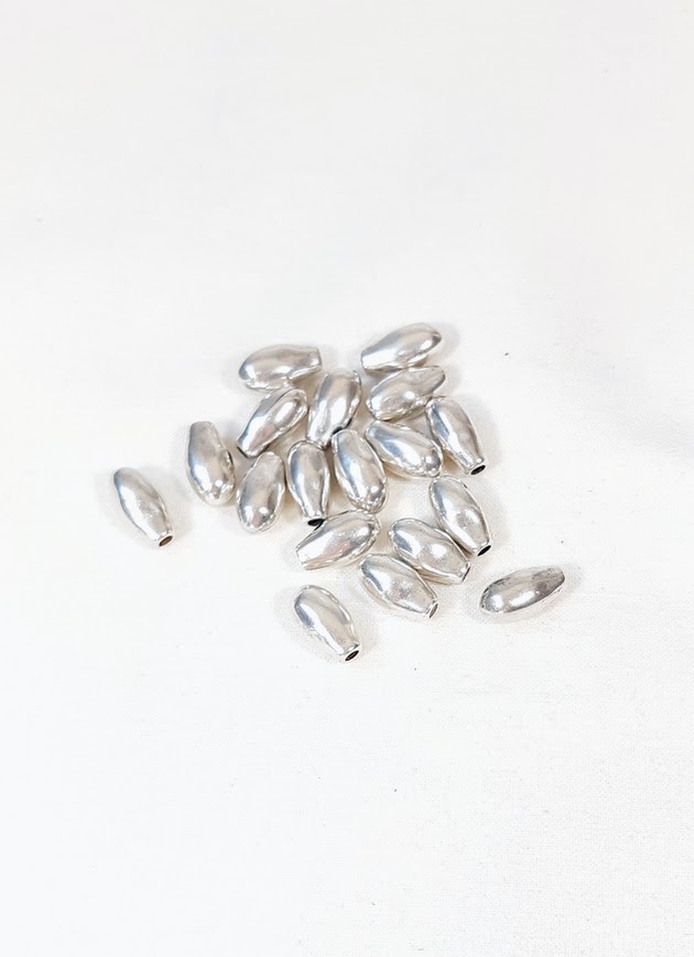 Lot embouts de cordon forme larme coloris argent