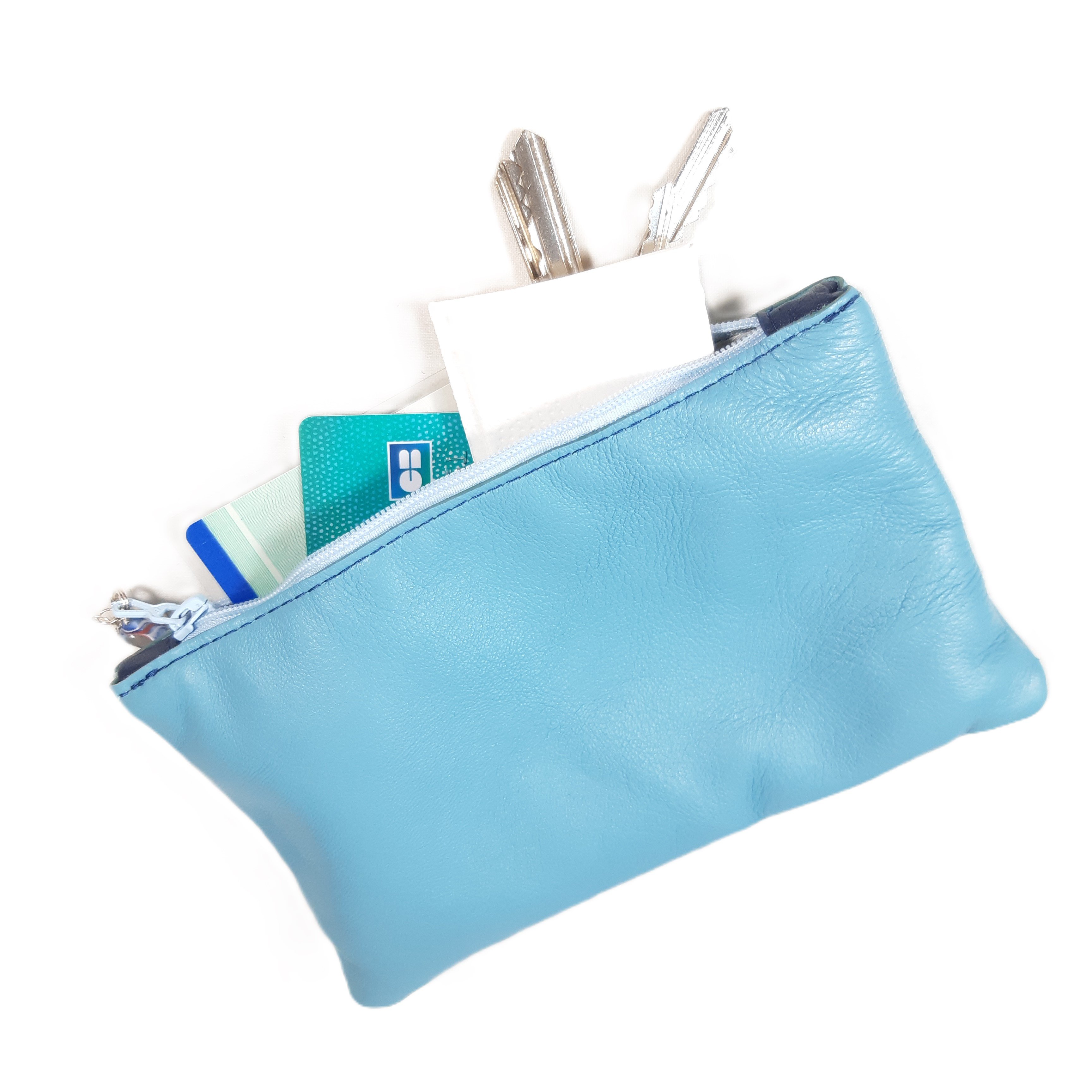 Pochette &agrave; glisser dans un grand sac, un sac de plage..