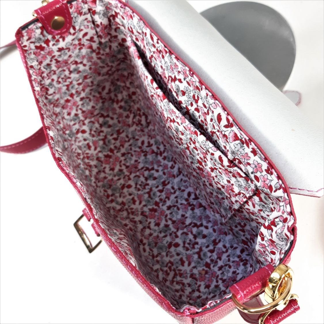 Fuchsia saco de couro de vaca de grão rosa